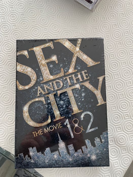 Vendo 2 filmes sexo e a cidade. Novo