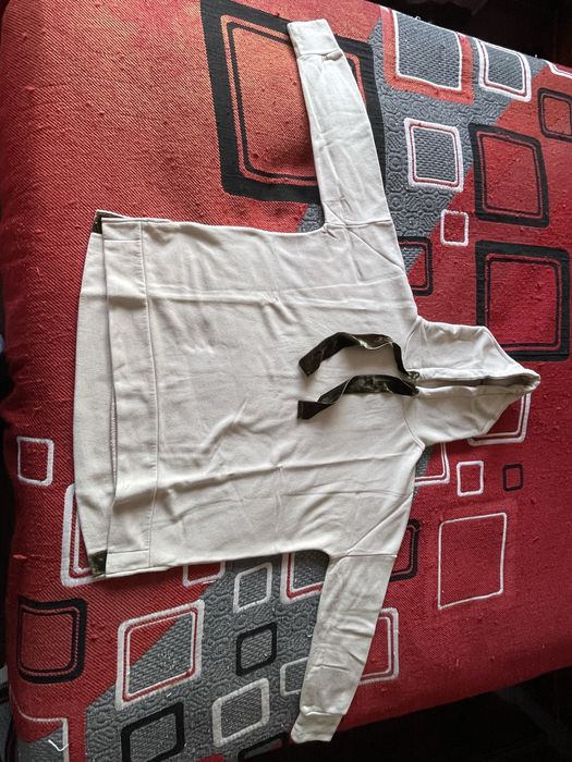 Sweatshirt com fitinhas