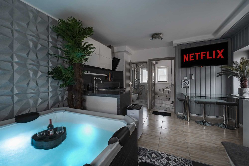 Domek Apartament Dwupoziomowy Love SPA Jacuzzi w pokoju kapsuła relaksacyjna możliwe śniadanie do pokoju strefa jacuzzi zewnętrzne grill rowery e-bike