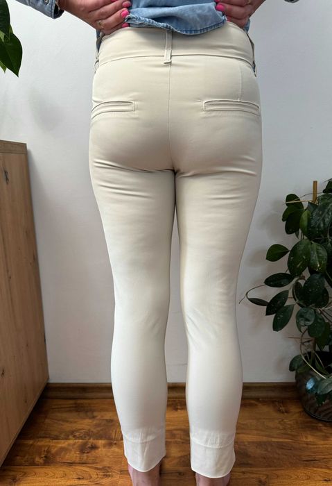 Eleganckie kremowe bawełniane spodnie chinos chinosy House of Lola XS