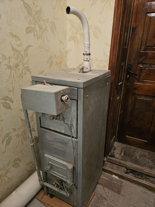 Котел твердопаливний з газовою колонкою