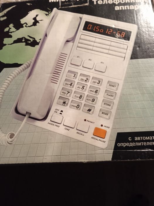 Телефон новий з визначником.