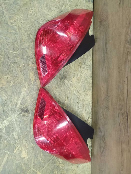 Peugeot 308 T7 hatchback lampa tył tylna prawa lewa oryginał wkład
