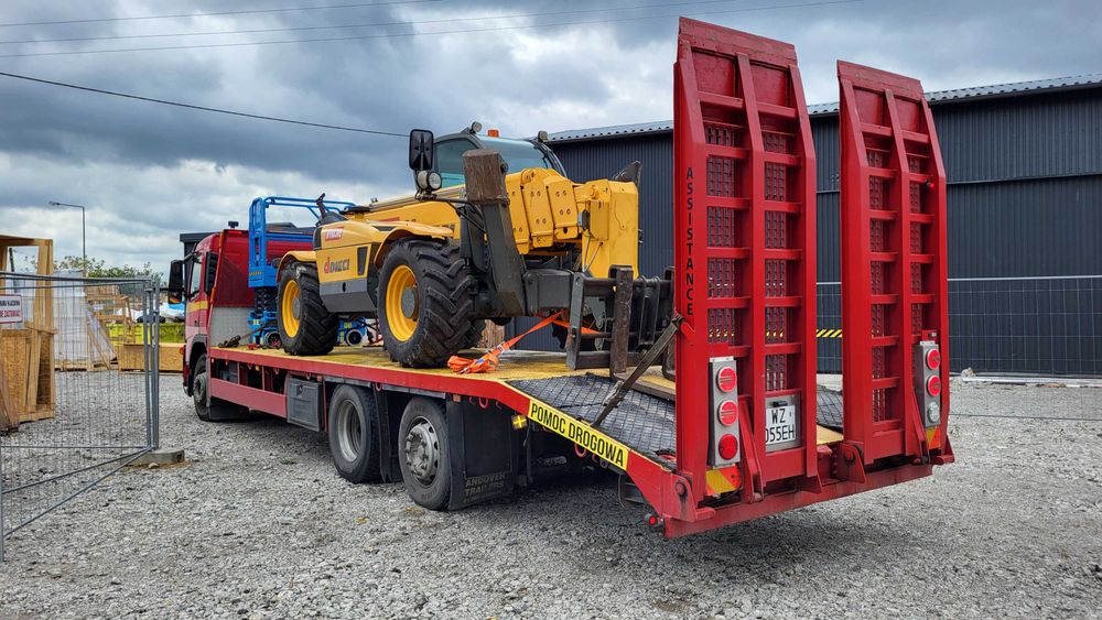 Transport maszyn budowlanych laweta pomoc drogowa usługa transportowa