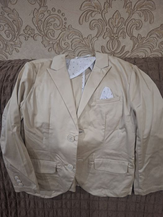Піджак новий ніразу не одягали
