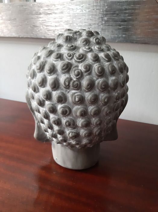 Cabeça de buda em cerâmica