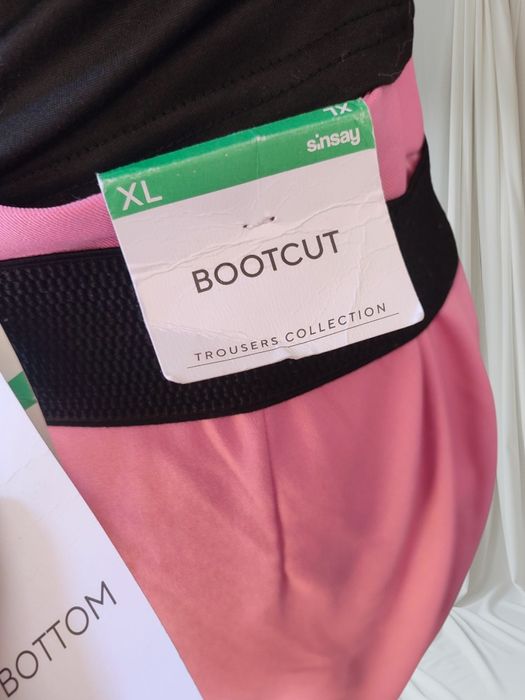 Różowe spodnie Sinsay bootcut nowe z metką