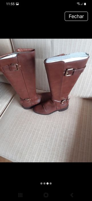 Botas cano alto em bom estado