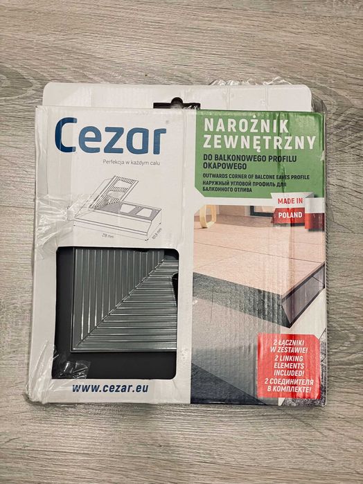 Narożnik zewnętrzny 90st  do profilu okapowego OKAP100 Cezar szary