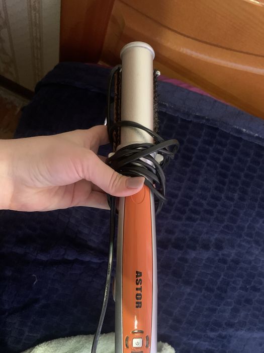 Плойка для вирівнювання і завивки волос