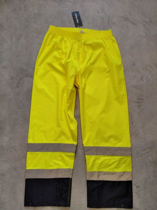 Nowe spodnie przeciwdeszczowe ostrzegawcze Portwest roz. XL