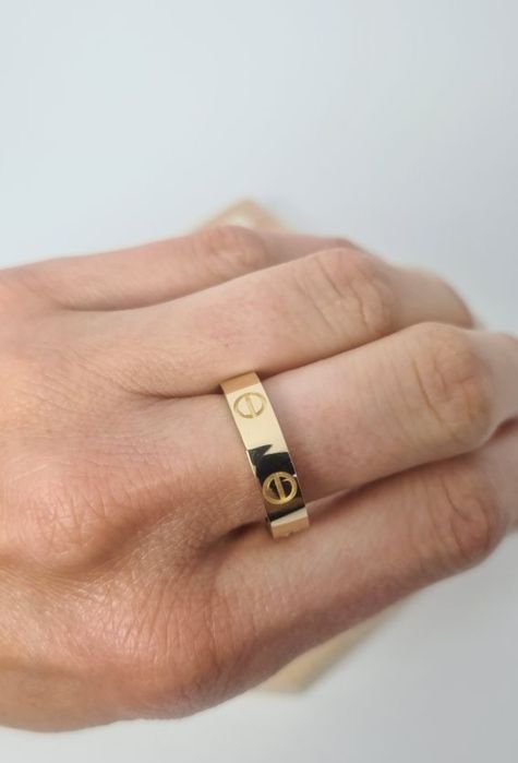 Złoty pierścionek obrączka typu Cartier śrubki p. 585