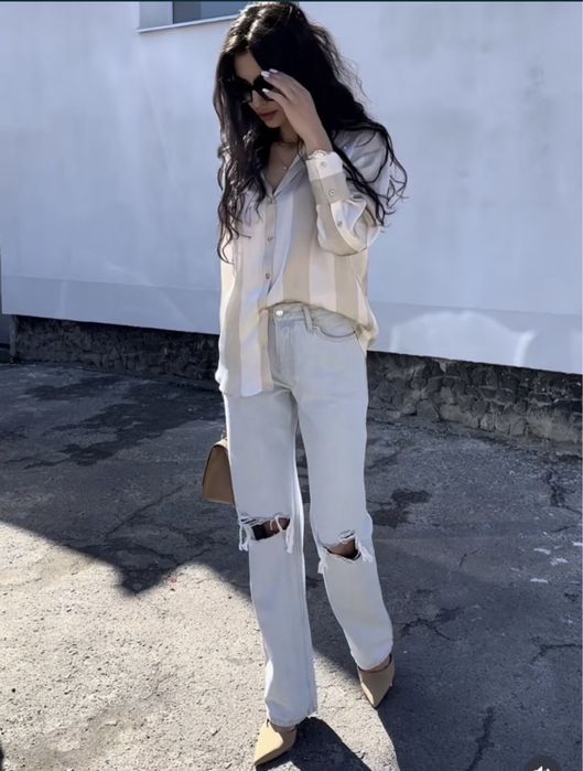 Джинси клеш труби з порваними колінами mango 36р.