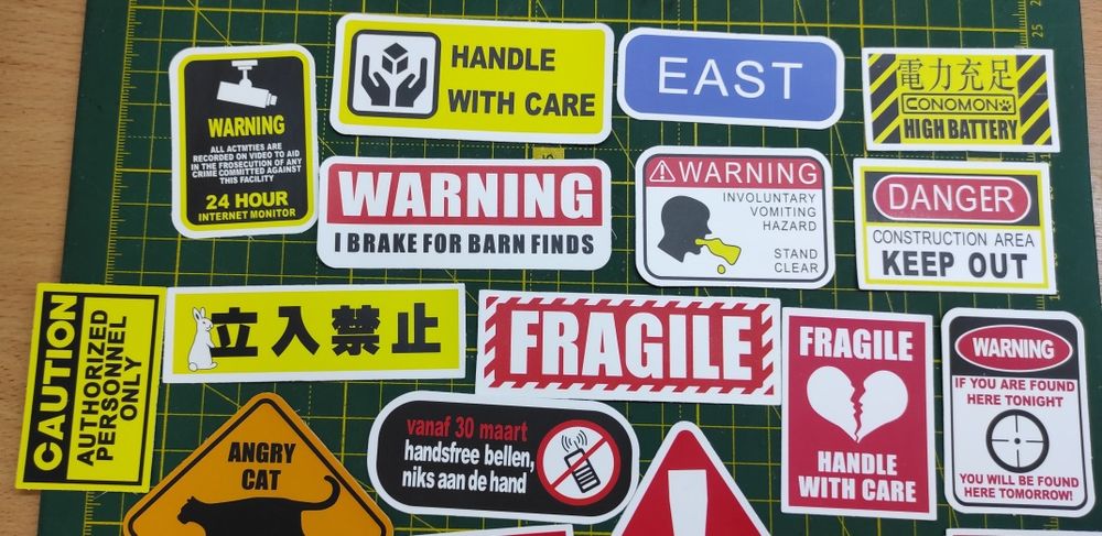 Наклейки попереджувальні знаки