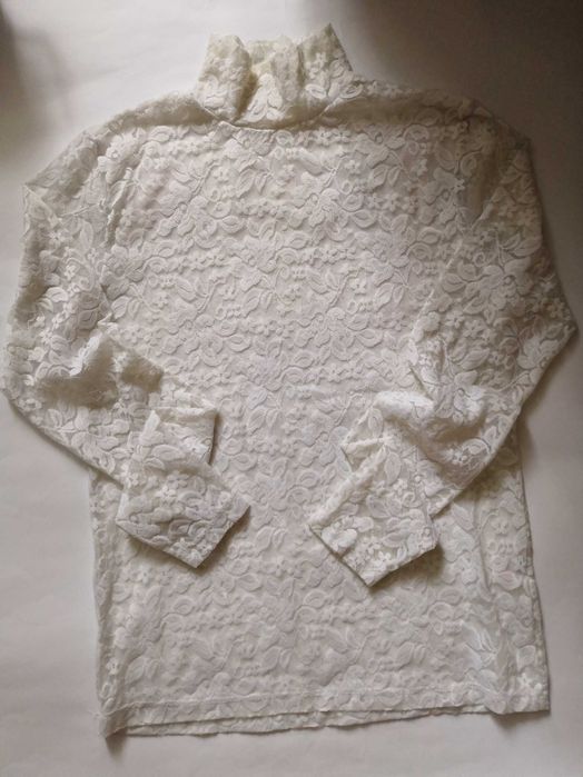 Легкий гольф на дівчинку на 12 років.