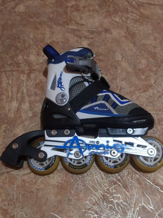 Роликовые коньки