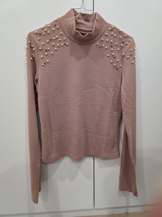 Camisola cor de rosa com pérolas