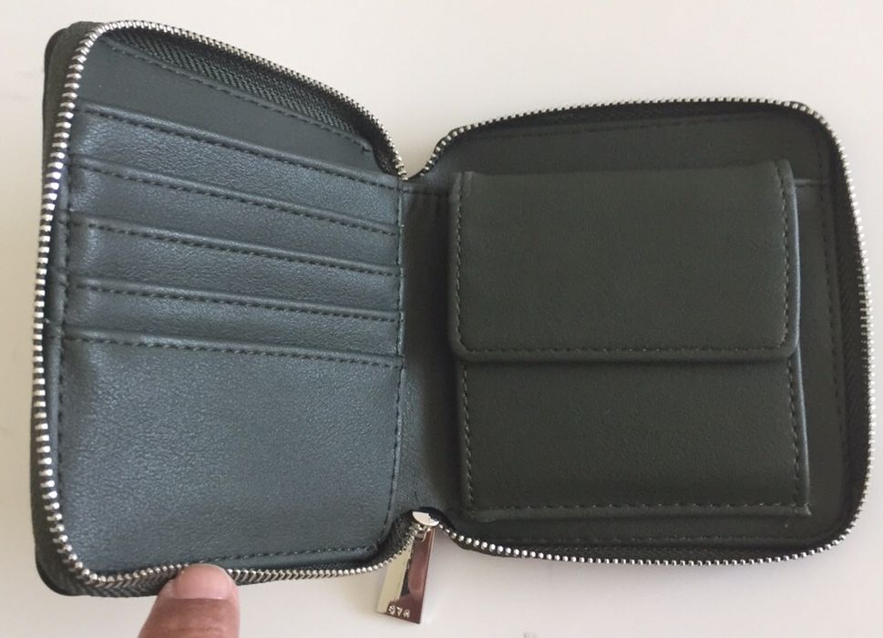 Porta-moedas e notas stradivarius