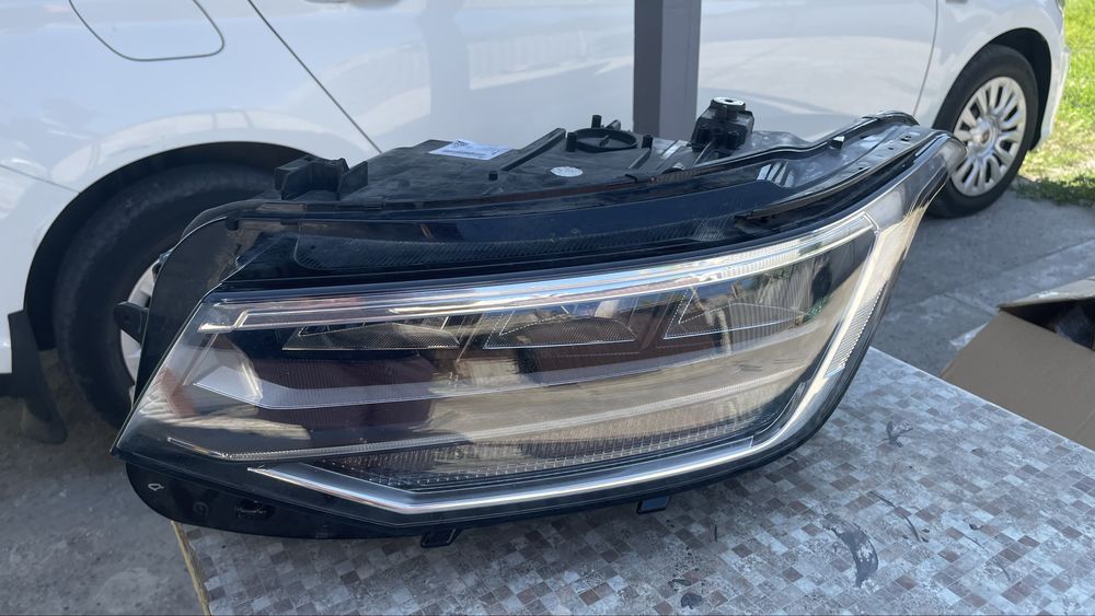 Фара левая vw tiguan USA