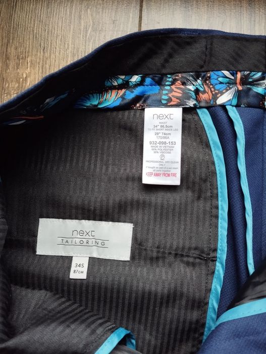 Lekkie eleganckie spodnie w kant slim fit rozm S