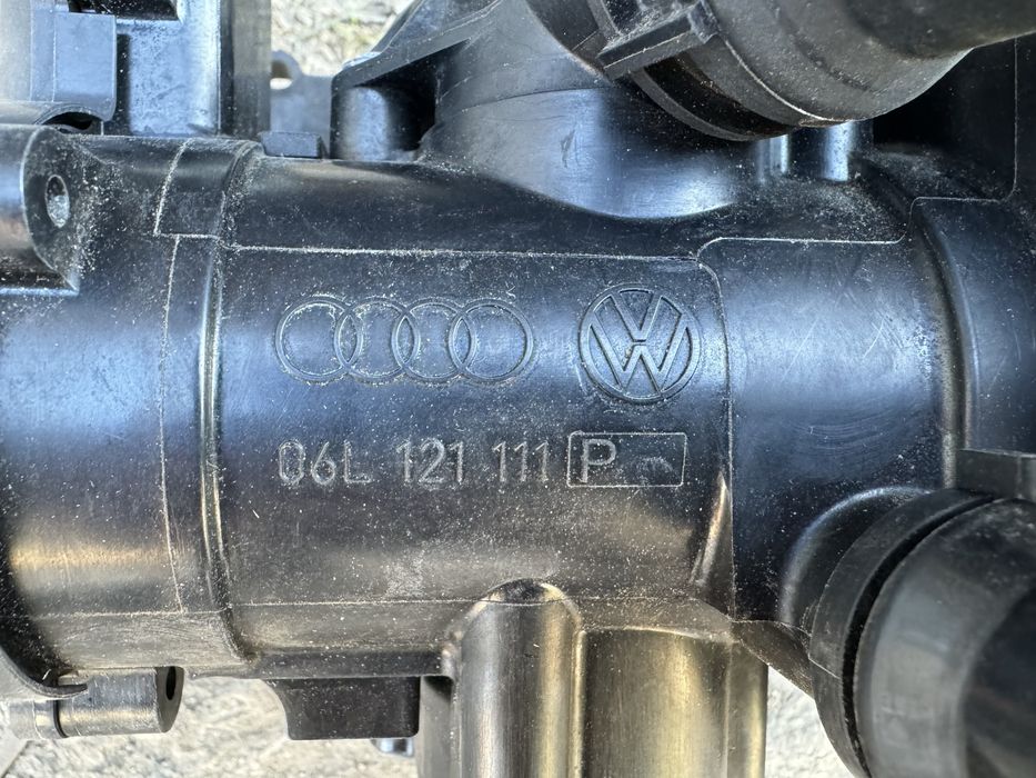 Помпа водяна (насос) охолодження, в зборі з корпусом 06L121111P VAG