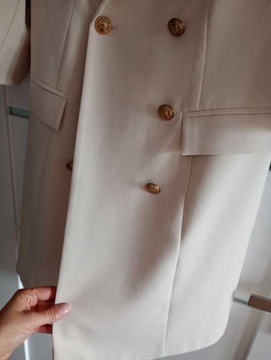 Elegancka marynarkowa sukienka