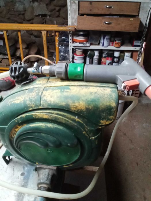 Enrolador de mangueira.