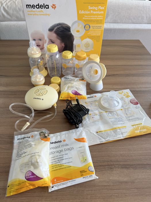 Melena bomba de leite com conjunto de biberoes