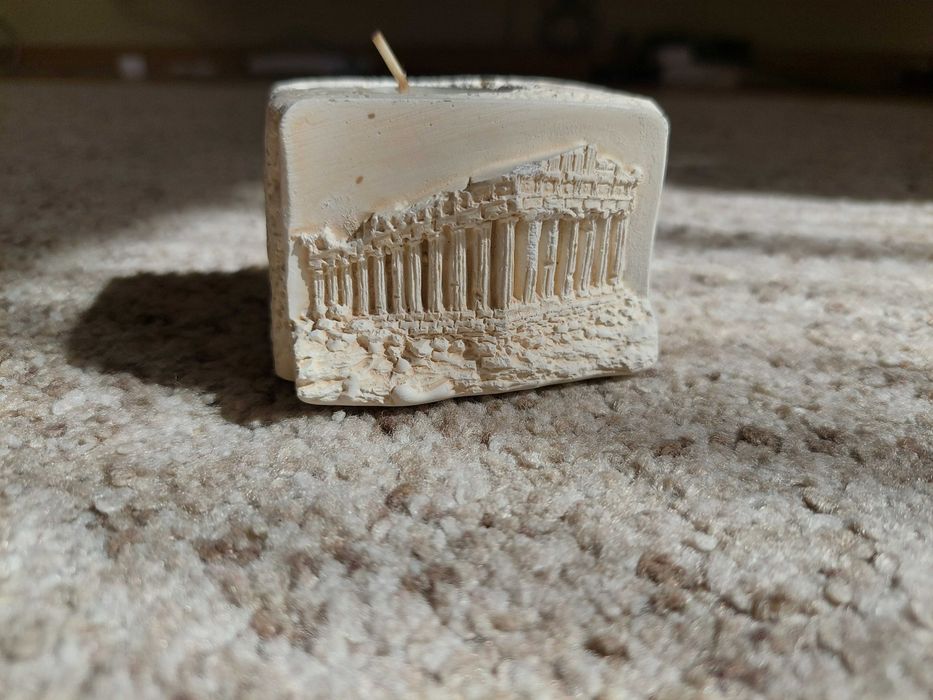 Vela com base em pedra