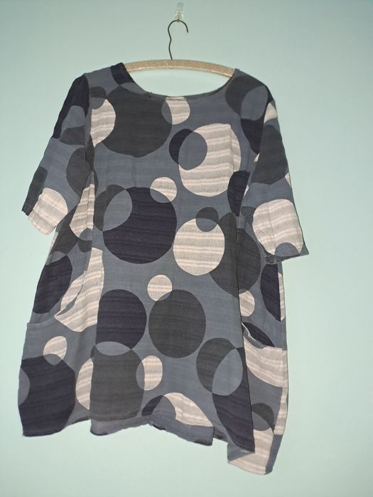 Tunika z kieszeniami.