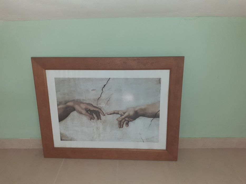 Quadro a mão de Deus, ou a criação de Adão. MiguelÂngelo