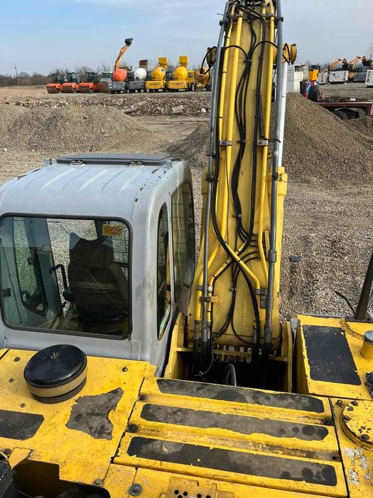 Екскаватор new holland