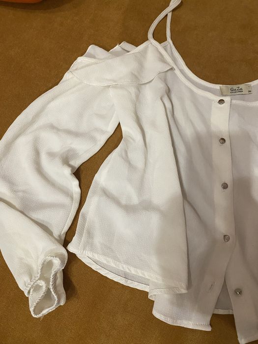 Вклрочена блуза.