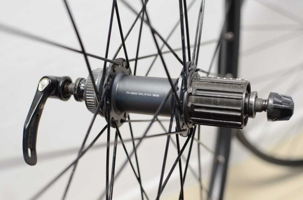 26" колеса Mavic / Shimano SLX, під дискові гальма, втулки Shimano SLX M665, барабан 8+ швидкостей на 4 собачках, вага 972 + 1191 г