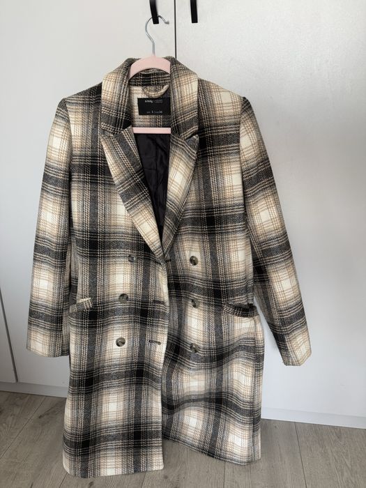 Пальто у клітинку.