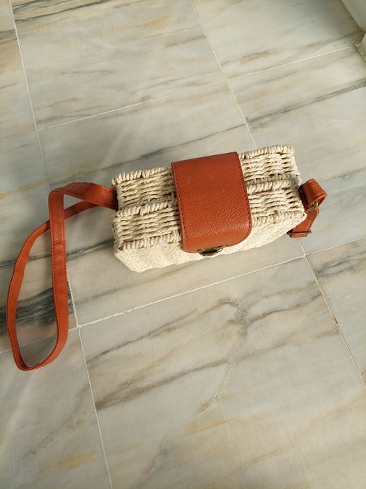 Mala a tiracolo ajustável