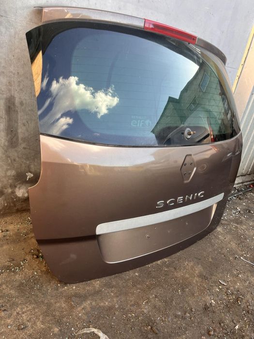 Двері ляда  капот  крило коричневий TCNB на рено гранд сценік 3