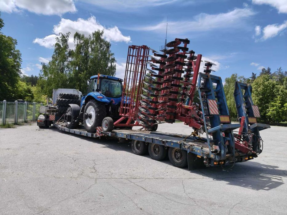 Послуги Трала перевезення негобаритних грузов комбайни трактора плуги