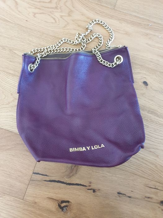 Mala beringela em pele bimba e lola