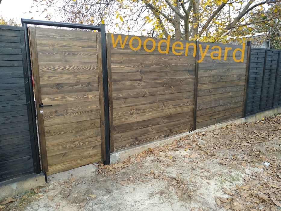 Ворота, заборы из дерева и металла.