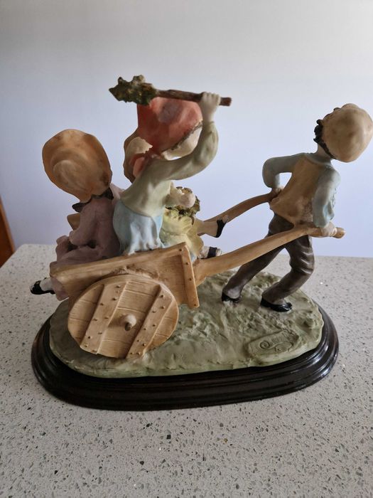 Boneco em marfinite genuíno vintage com data e assinatura