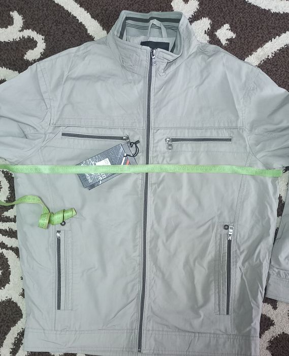 Нова чоловіча вітровка