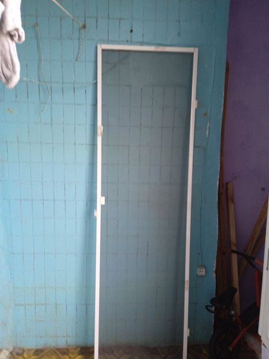 Сетка для балконой двери