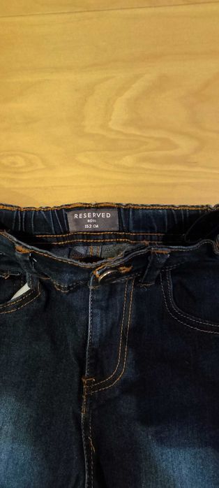 Spodnie chłopięce granatowe jeans Reservet rozmiar 152