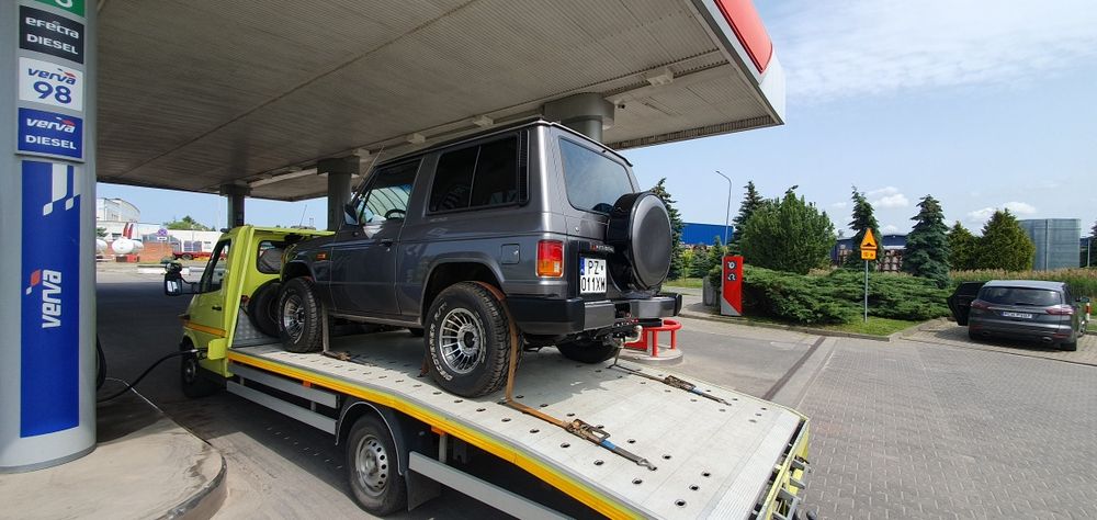 Pomoc drogowa - transport pojazdów - holowanie  - autolaweta
