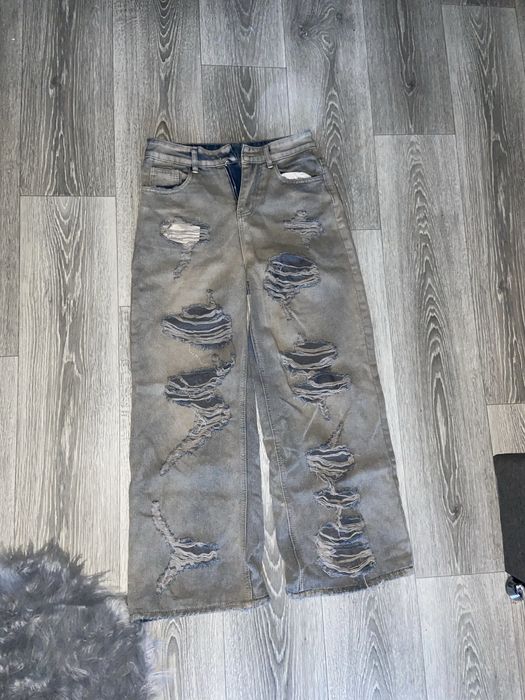 рваные джинсы