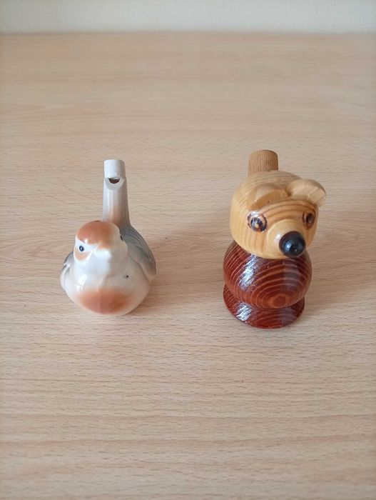 Свистульки керамічна та дерев'яна.