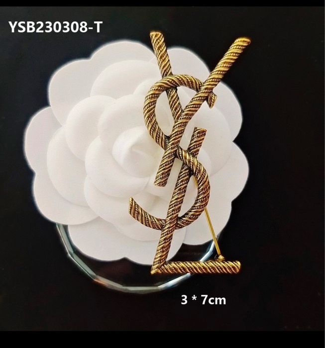 Nowa broszka YSL star zloto 7 cm