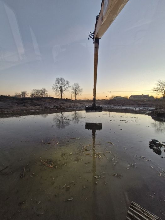 Wynajem koparki long