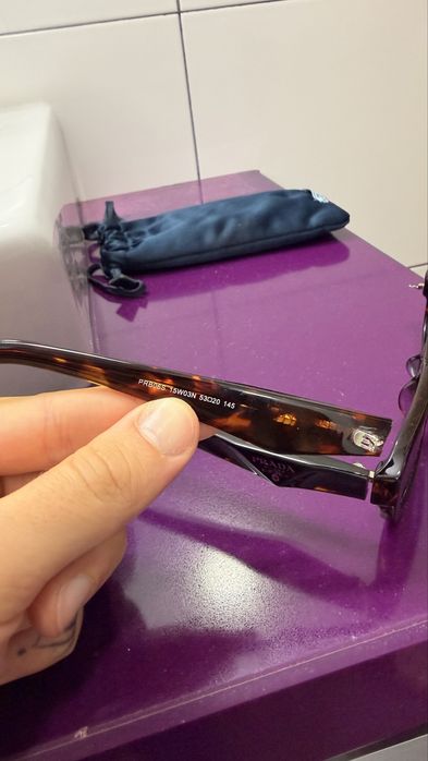 2 pares de oculos da prada